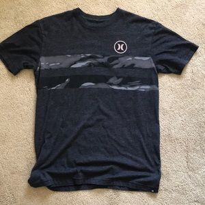 This is a mens medium Hurley brand short sleeve shirt.